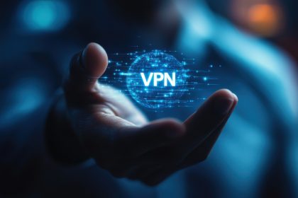 Man holding a glowing VPN icon in his hand.