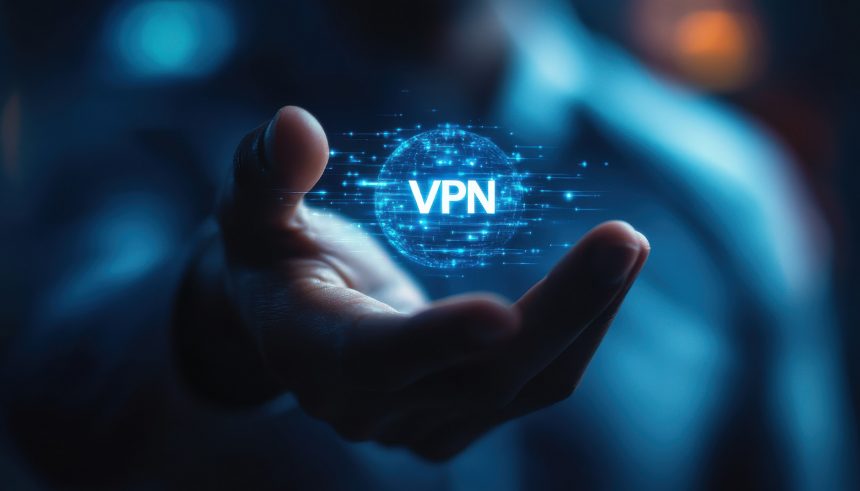 Man holding a glowing VPN icon in his hand.