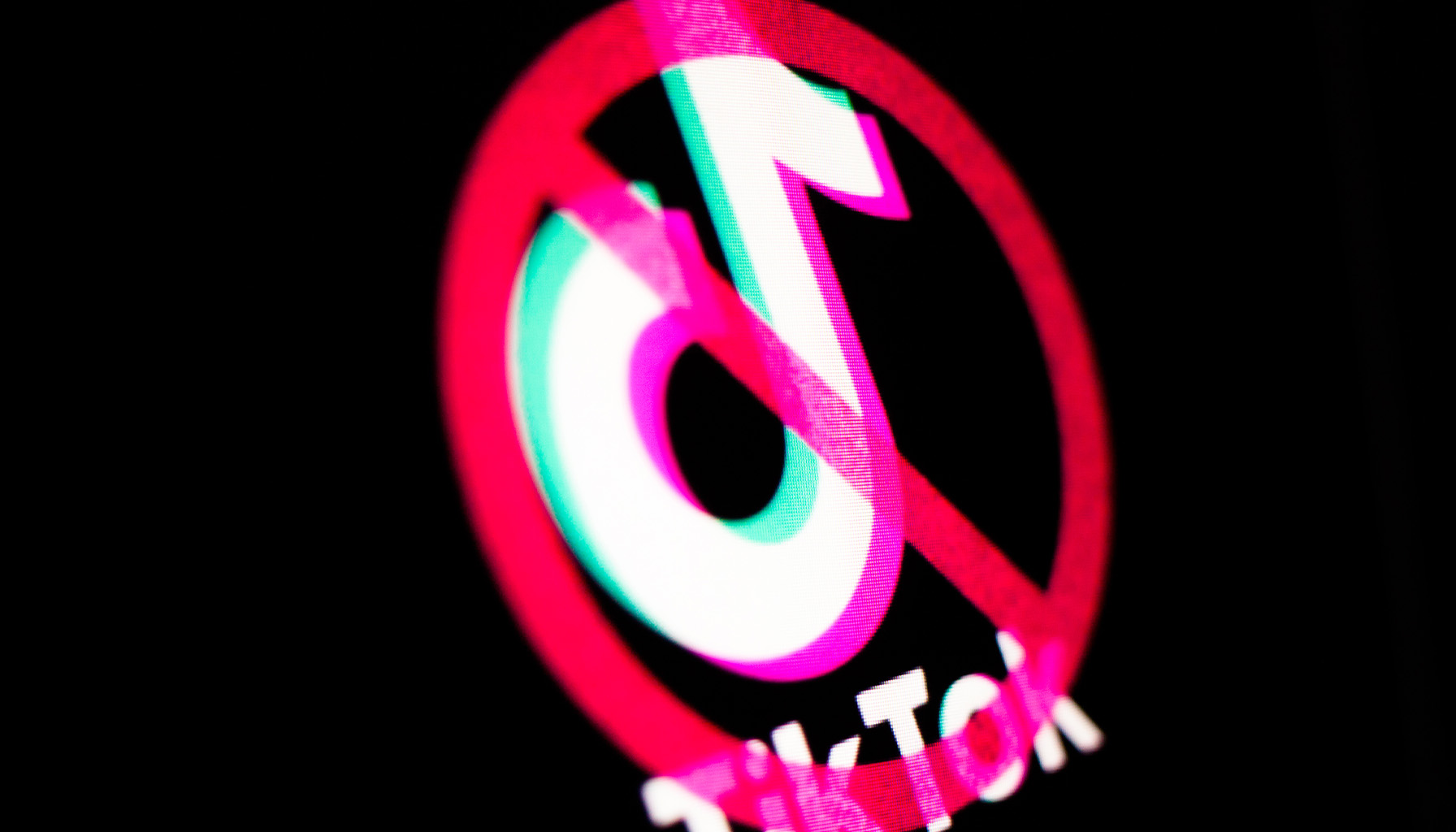 TikTok logo with a red “banned” sign overlayed, symbolizing restrictions on the app.