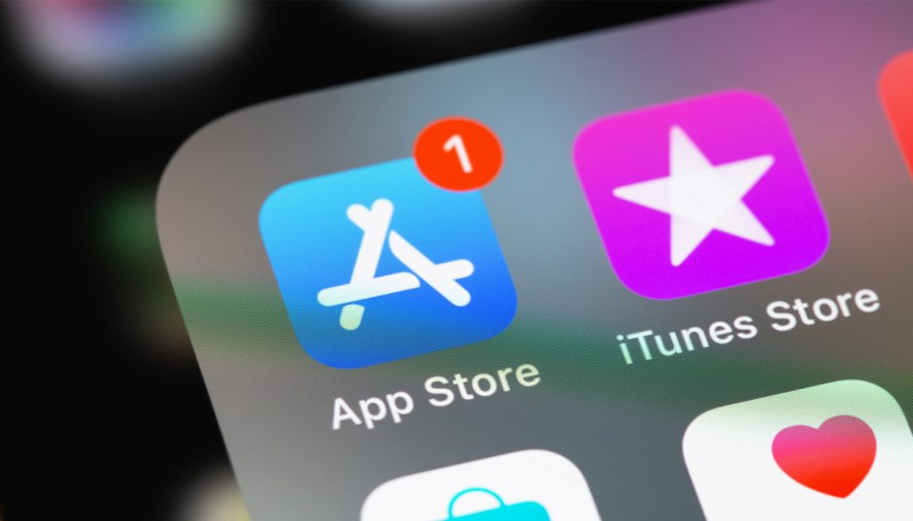 Close-up view of the App Store icon on an iPhone screen with a notification badge.